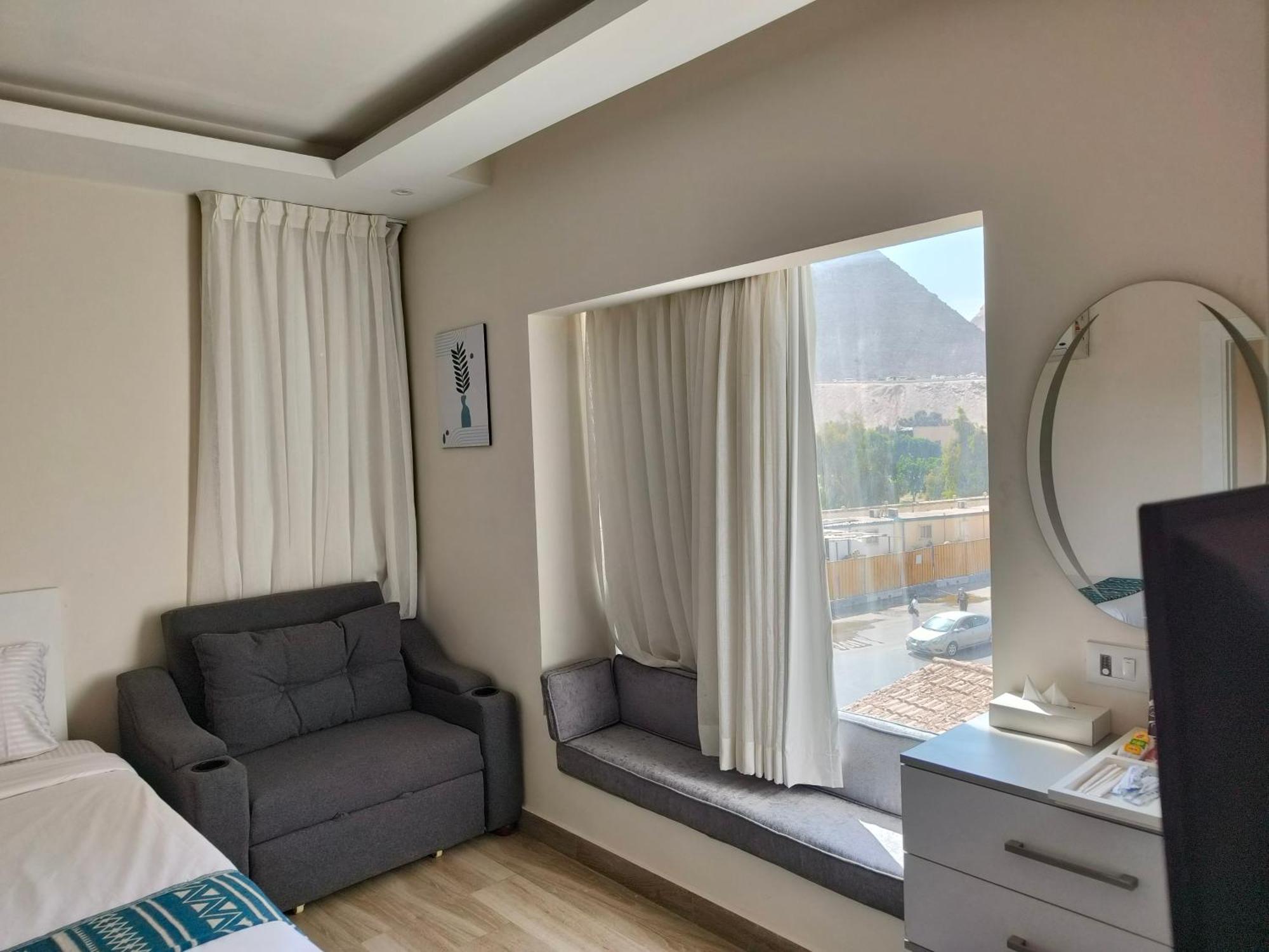 Отель Maria Pyramids House Kafrat al Jabal Номер фото